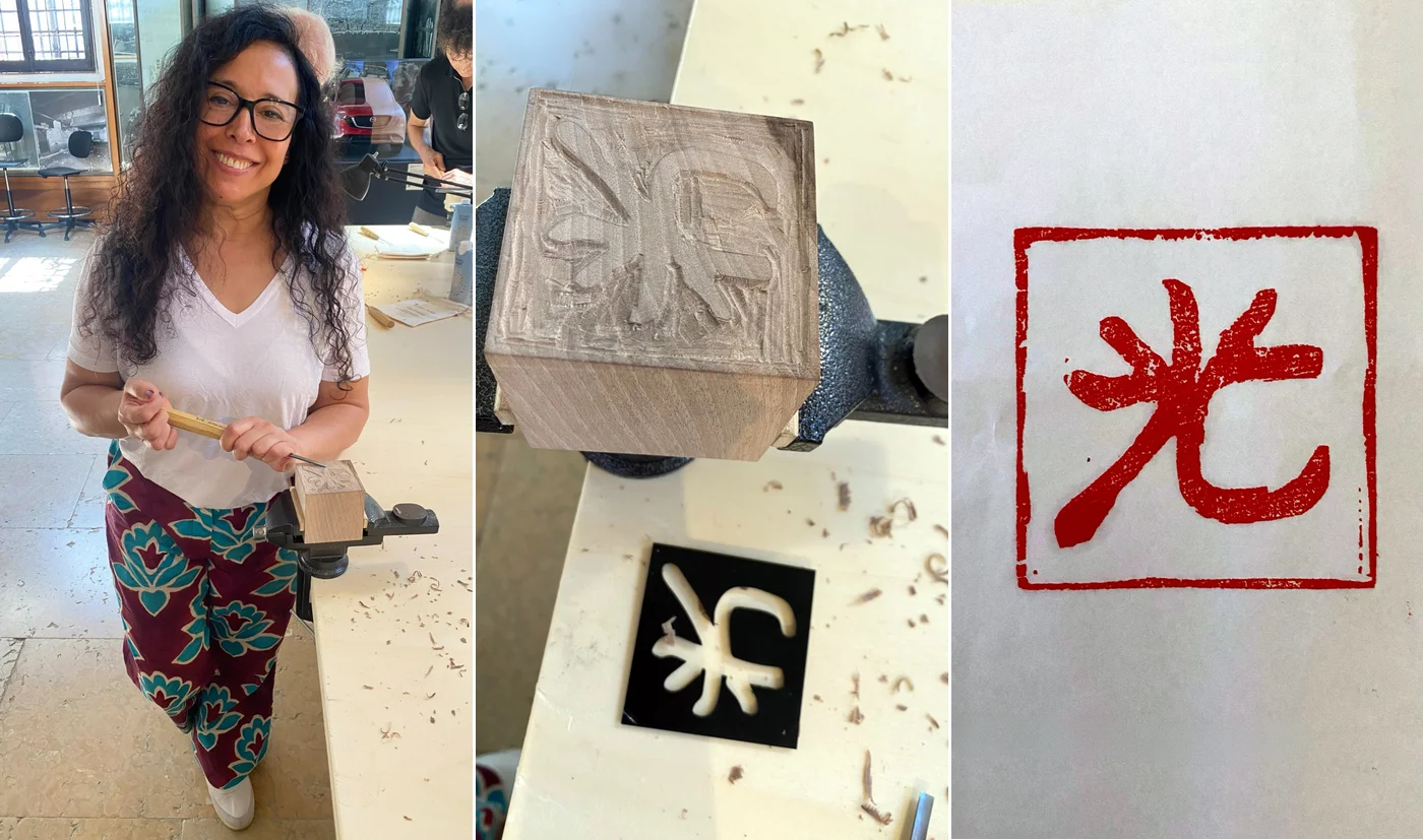 Tallando un sello de hanko con el kanji de la luz durante el taller de Homo Faber 2026